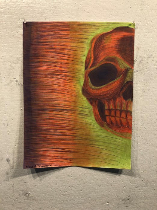 drawing of a orange skull with neon background