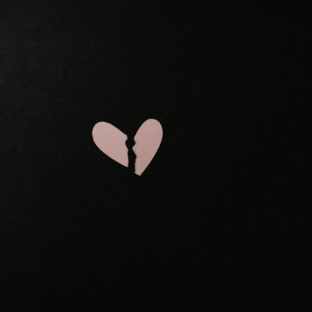 a pink heart split in half